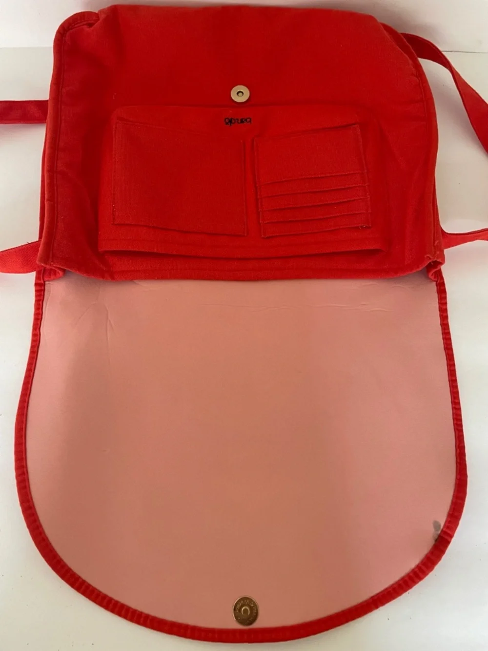 ban.do Red laptop Bag with Curved Slogan